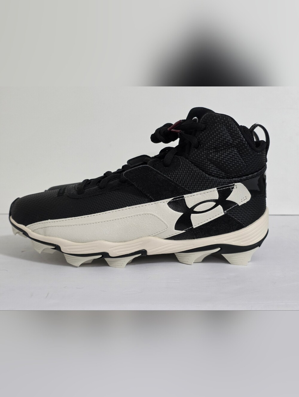 Under Armour Black and Cream Baseball Cleats